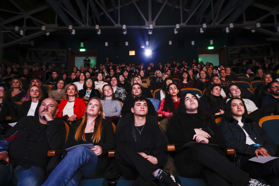 Audience watching a movie in a screening room