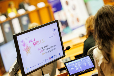 Screen with event visual Skills, skills, skills in the European Parliament